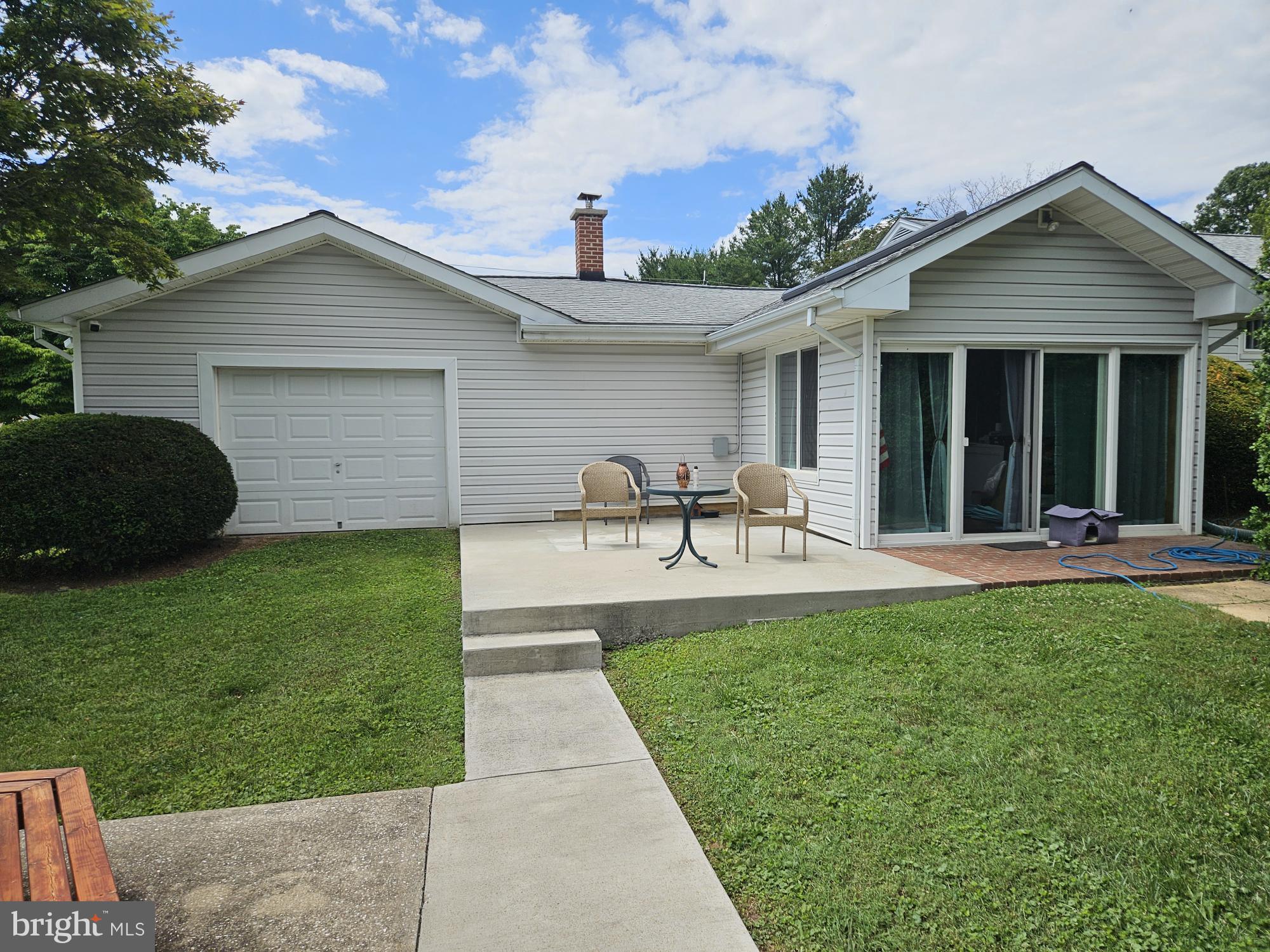 7015 Woodbine Road Woodbine, MD 21797 - Photo 6 of 60 Back View of attached garage and sunroom