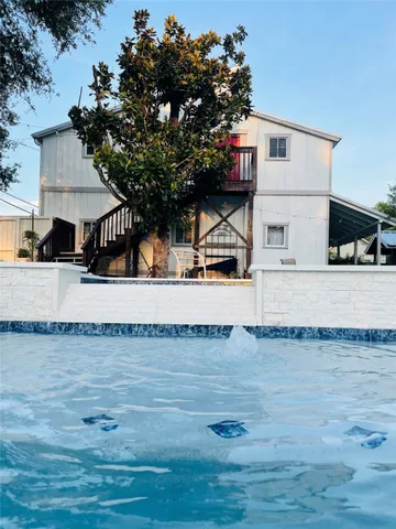 a view of a house with a patio