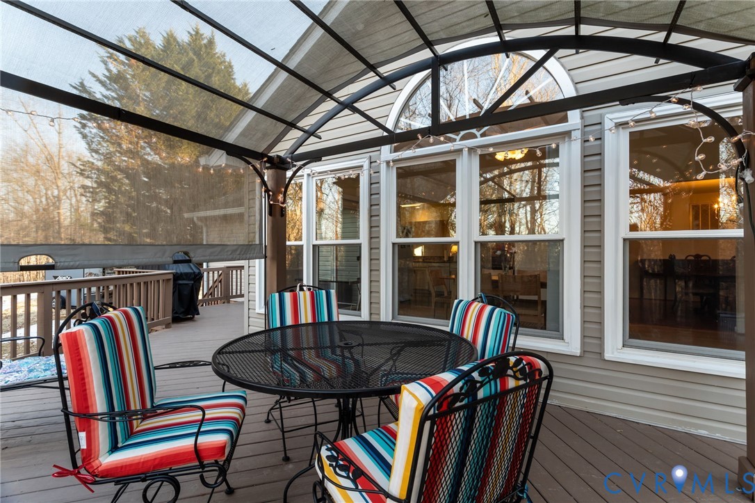 518 Rebel Ridge Road Colonial Heights, VA 23834 - Photo 36 of 44 a view of a patio with a table chairs and a table