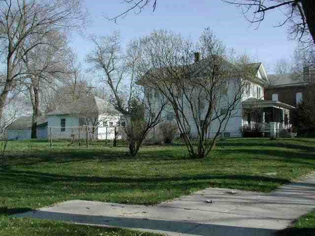 109 Adams Street Ridott, IL 61067 - Photo 3 of 5 a view of a park with large trees