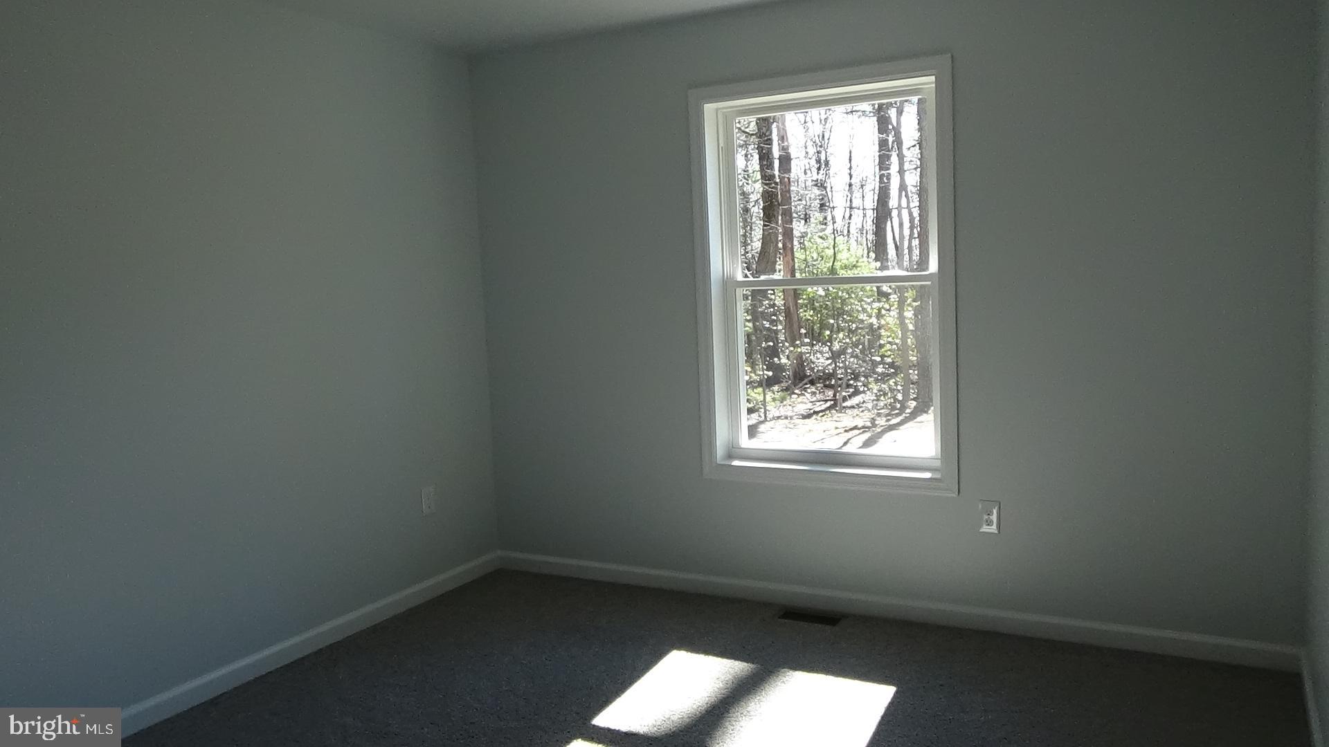 746 Hilltop Road Millerstown, PA 17062 - Photo 11 of 24 an empty room with a window