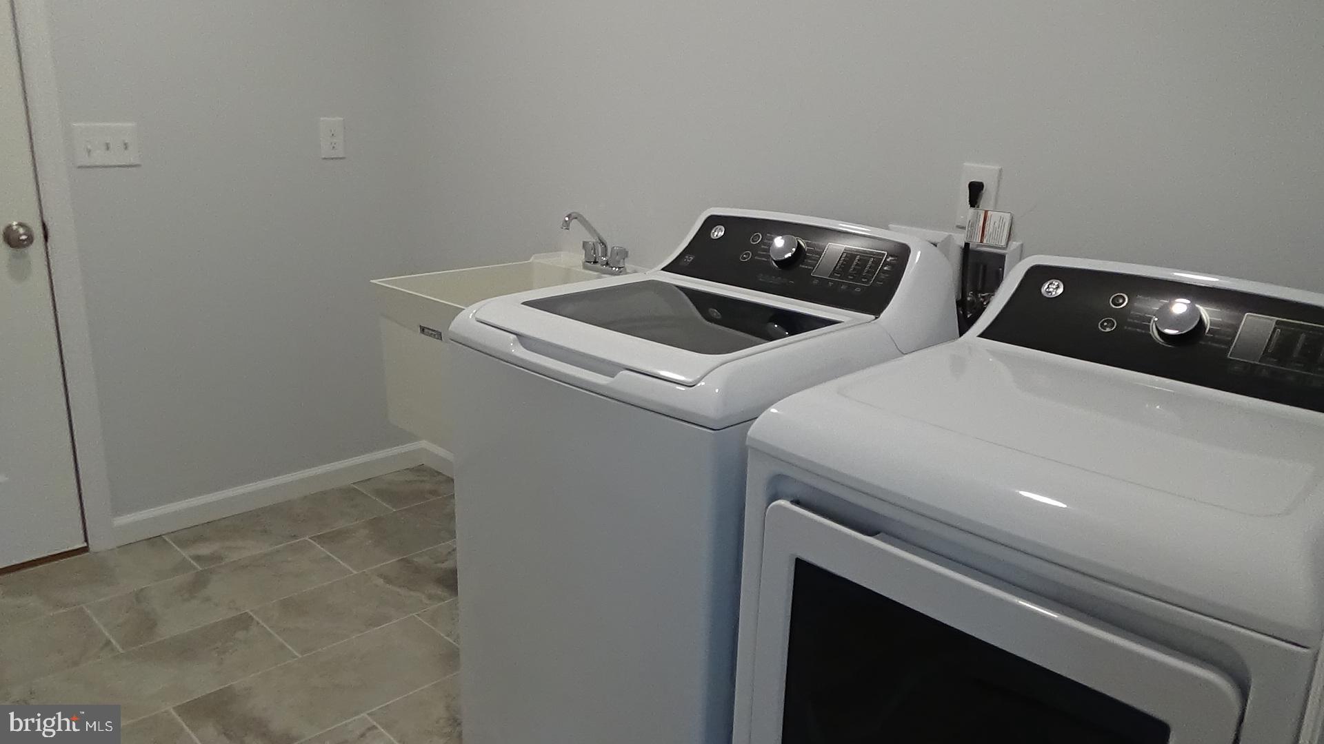 746 Hilltop Road Millerstown, PA 17062 - Photo 12 of 24 a utility room with dryer and washer