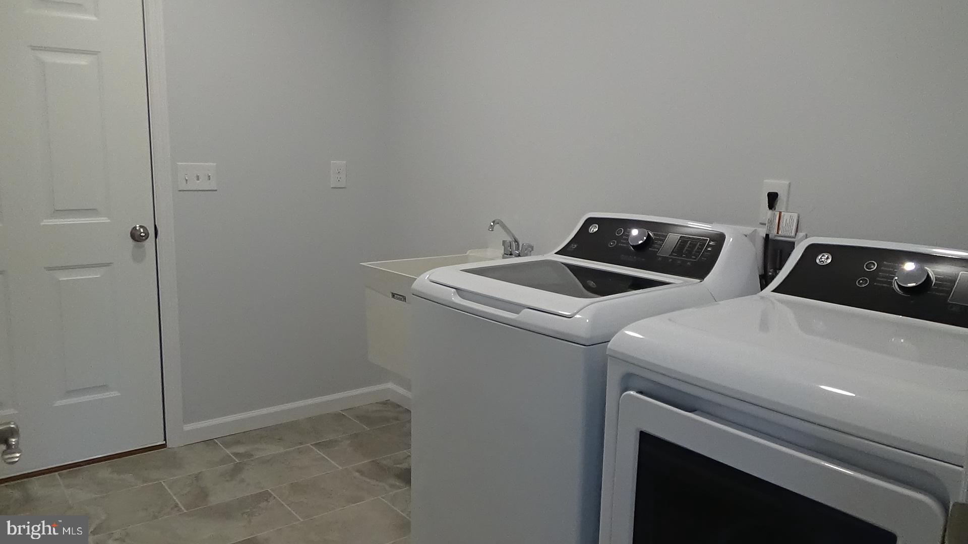 746 Hilltop Road Millerstown, PA 17062 - Photo 13 of 24 a utility room with dryer and washer