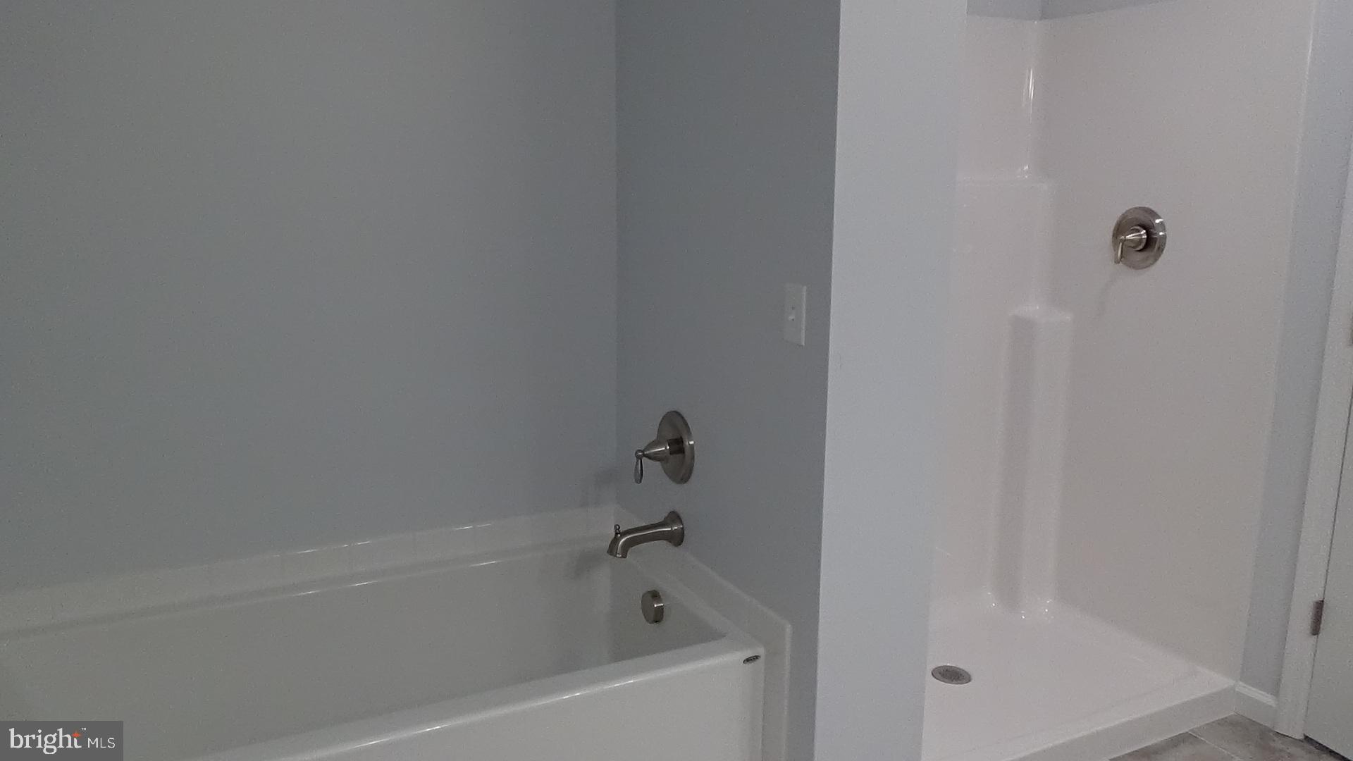 746 Hilltop Road Millerstown, PA 17062 - Photo 15 of 24 a bathroom with a bathtub