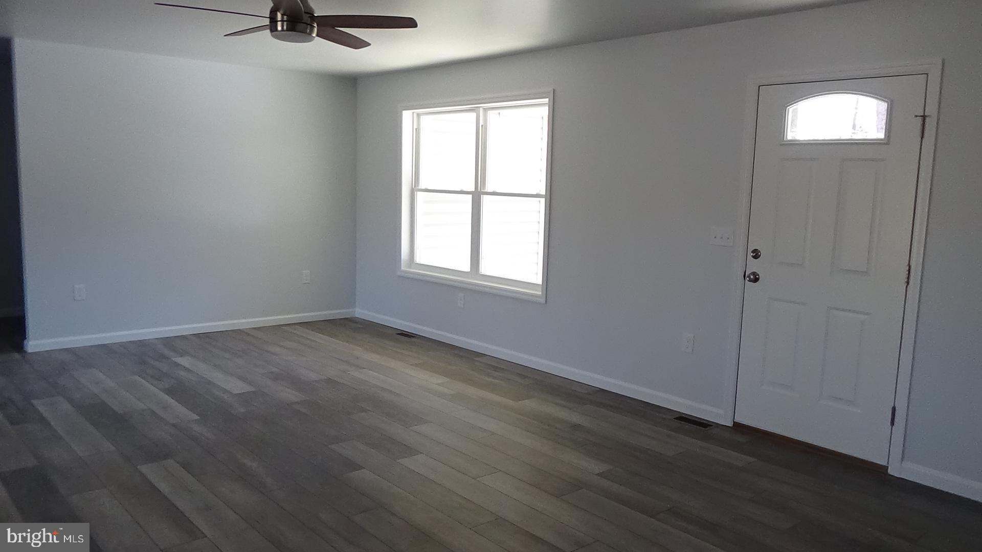 746 Hilltop Road Millerstown, PA 17062 - Photo 7 of 24 an empty room with a window