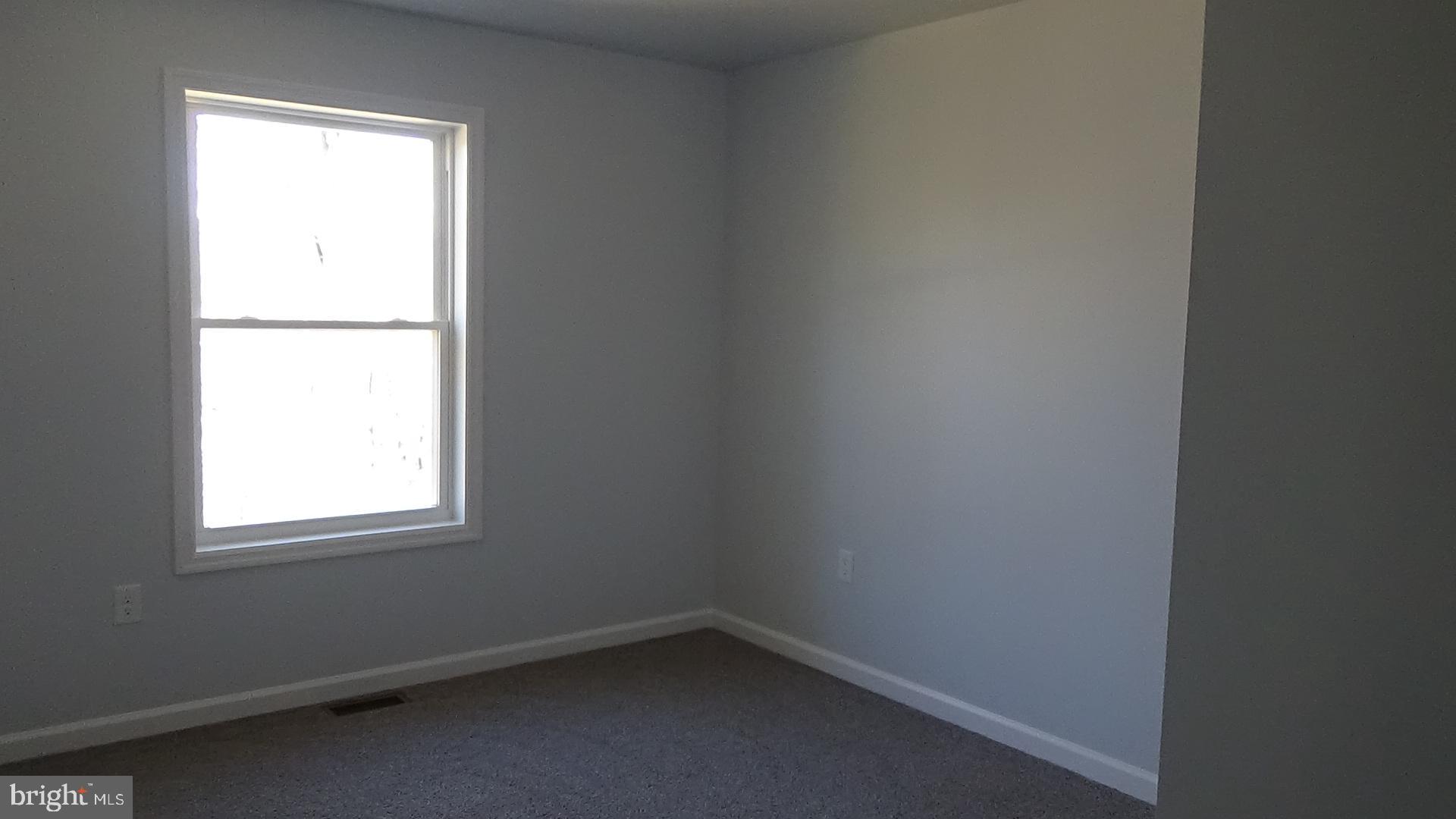 746 Hilltop Road Millerstown, PA 17062 - Photo 9 of 24 an empty room with a window