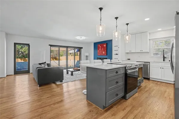 a view of a kitchen and dining room