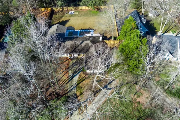 a view of a house in a forest