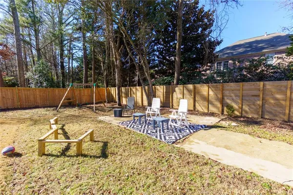 an aerial view of a house with yard swimming pool and outdoor seating