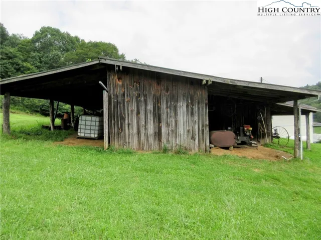 a view of a chair under an umbrella