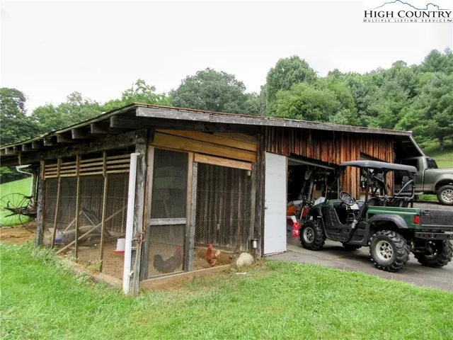 a view of car parked in front of house
