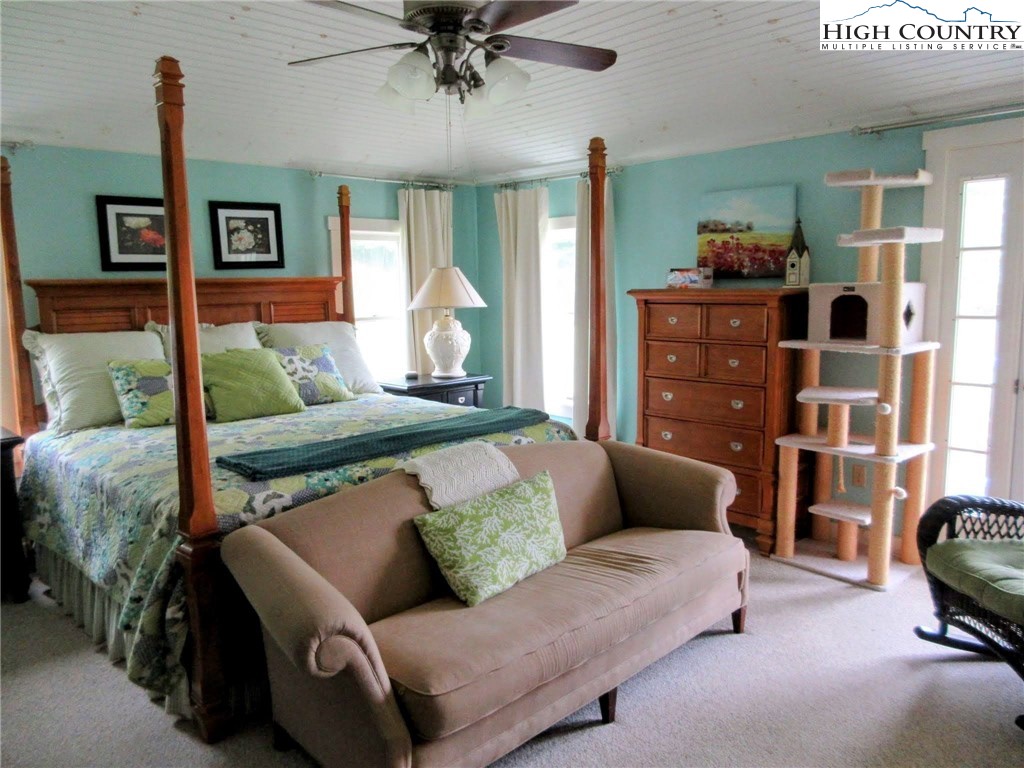 1294 Spencer Branch Road Lansing, NC 28643 - Photo 5 of 42 a living room with furniture and a couch