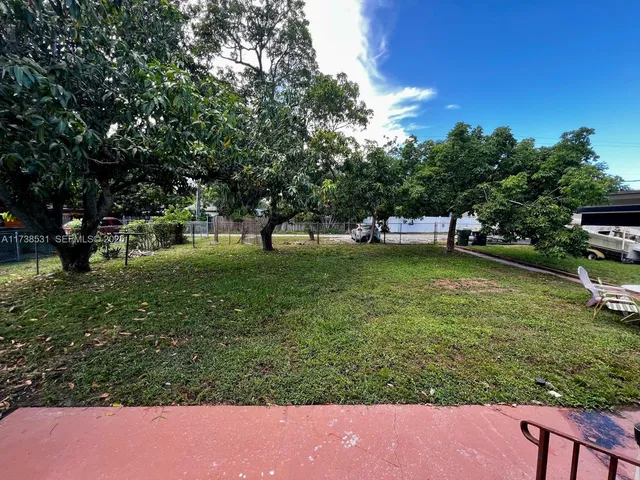a view of a hallway with elevator
