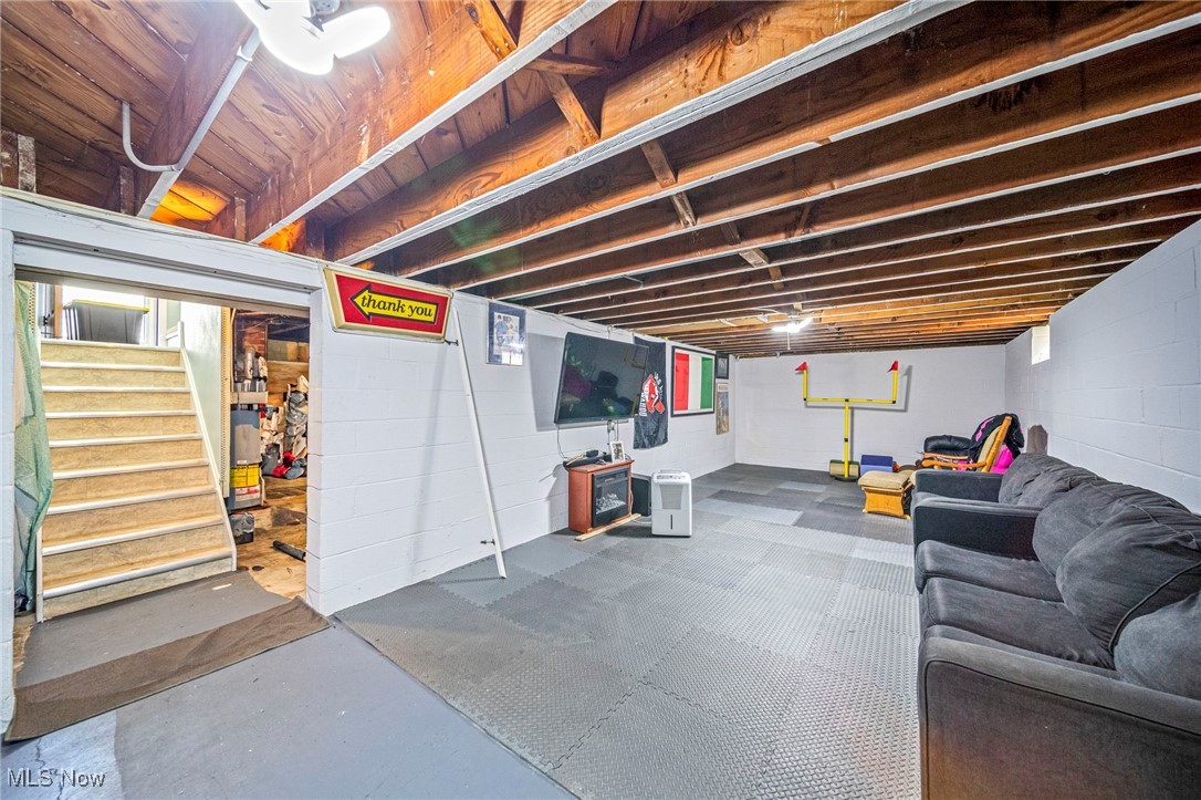 28666 Forest Road Willowick, OH 44095 - Photo 20 of 27 Basement featuring stairway and concrete block wall
