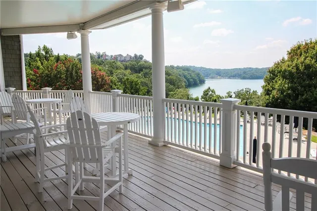 a room with lots of furniture and a flat screen tv