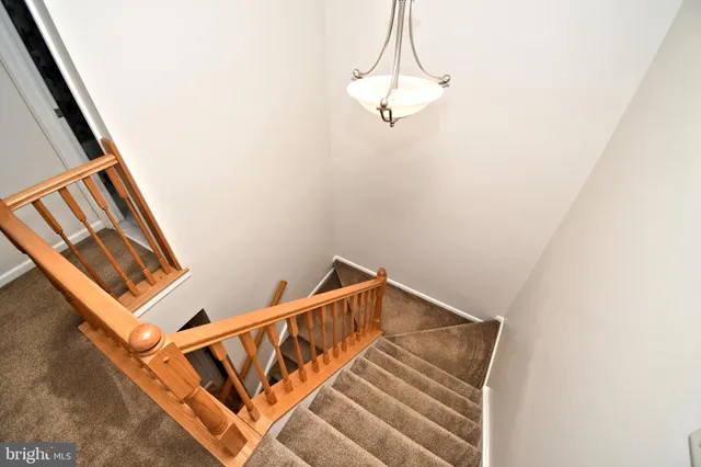 a view of a hallway with windows