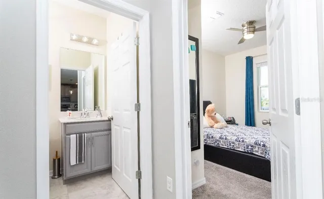 a view of a bedroom from a hallway