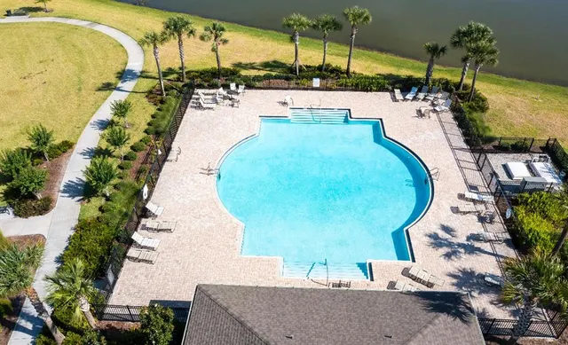 an aerial view of a swimming pool
