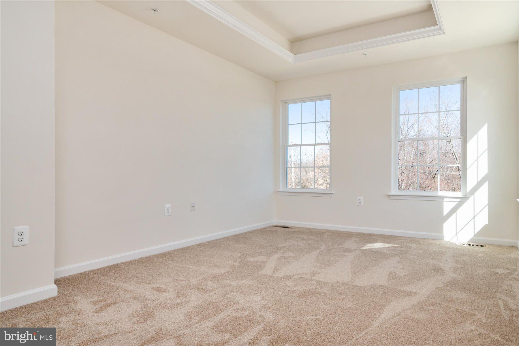 7412 Rossville Boulevard Rosedale, MD 21237 - Photo 18 of 37 an empty room with windows