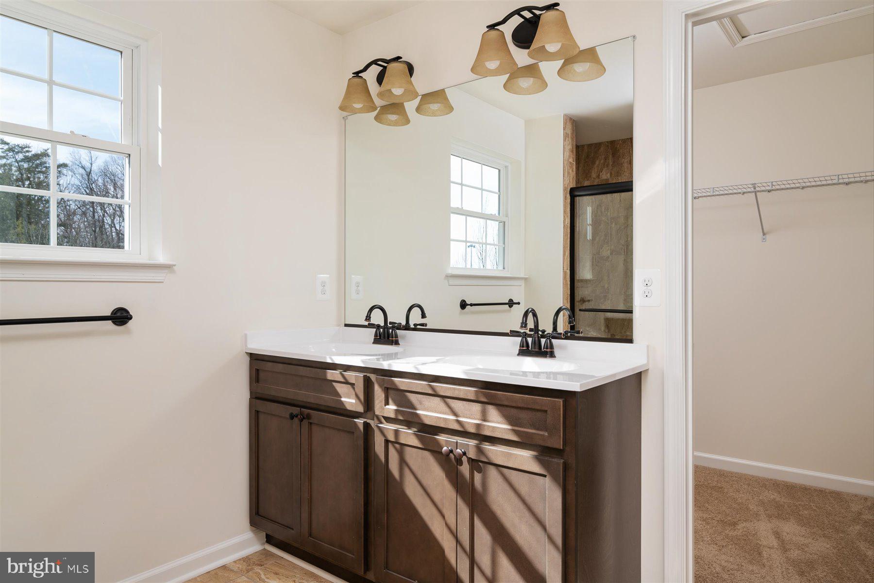 7412 Rossville Boulevard Rosedale, MD 21237 - Photo 22 of 37 a kitchen with a sink and a window