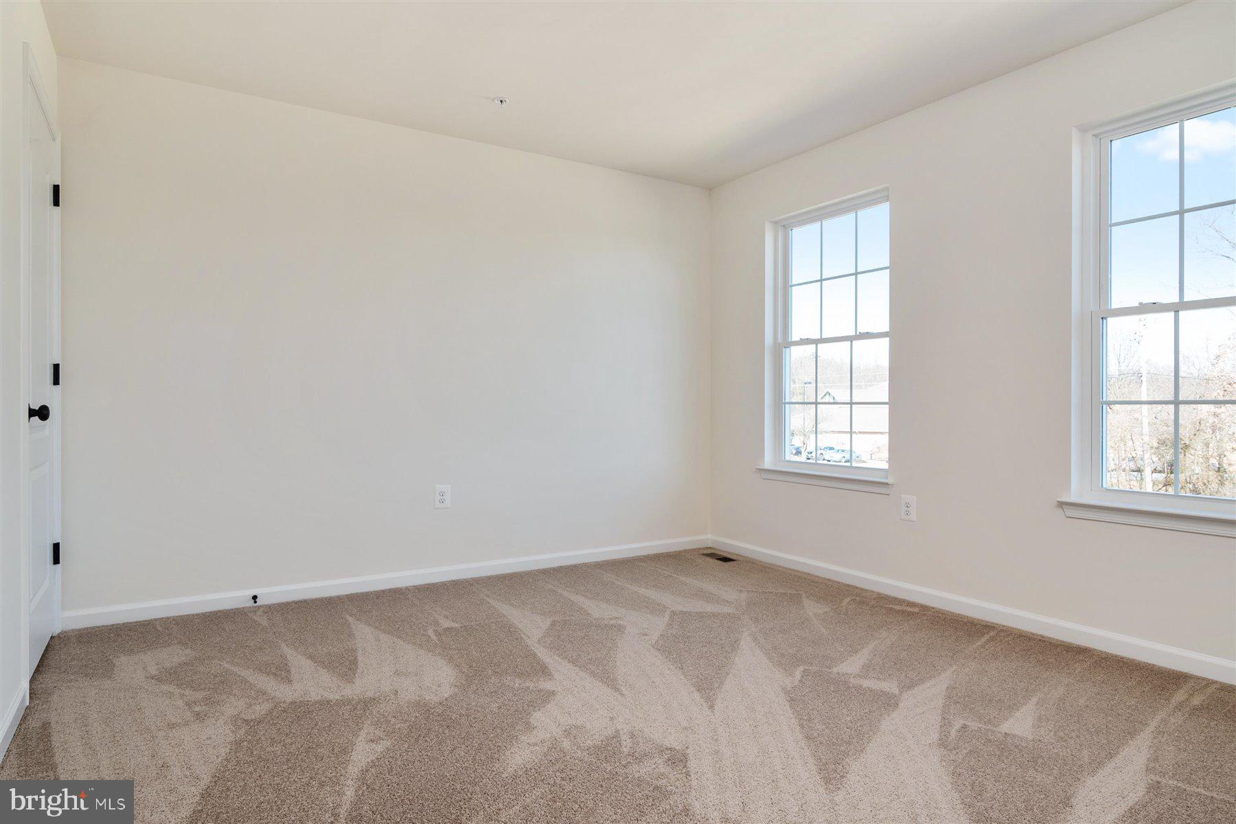 7412 Rossville Boulevard Rosedale, MD 21237 - Photo 25 of 37 an empty room with windows