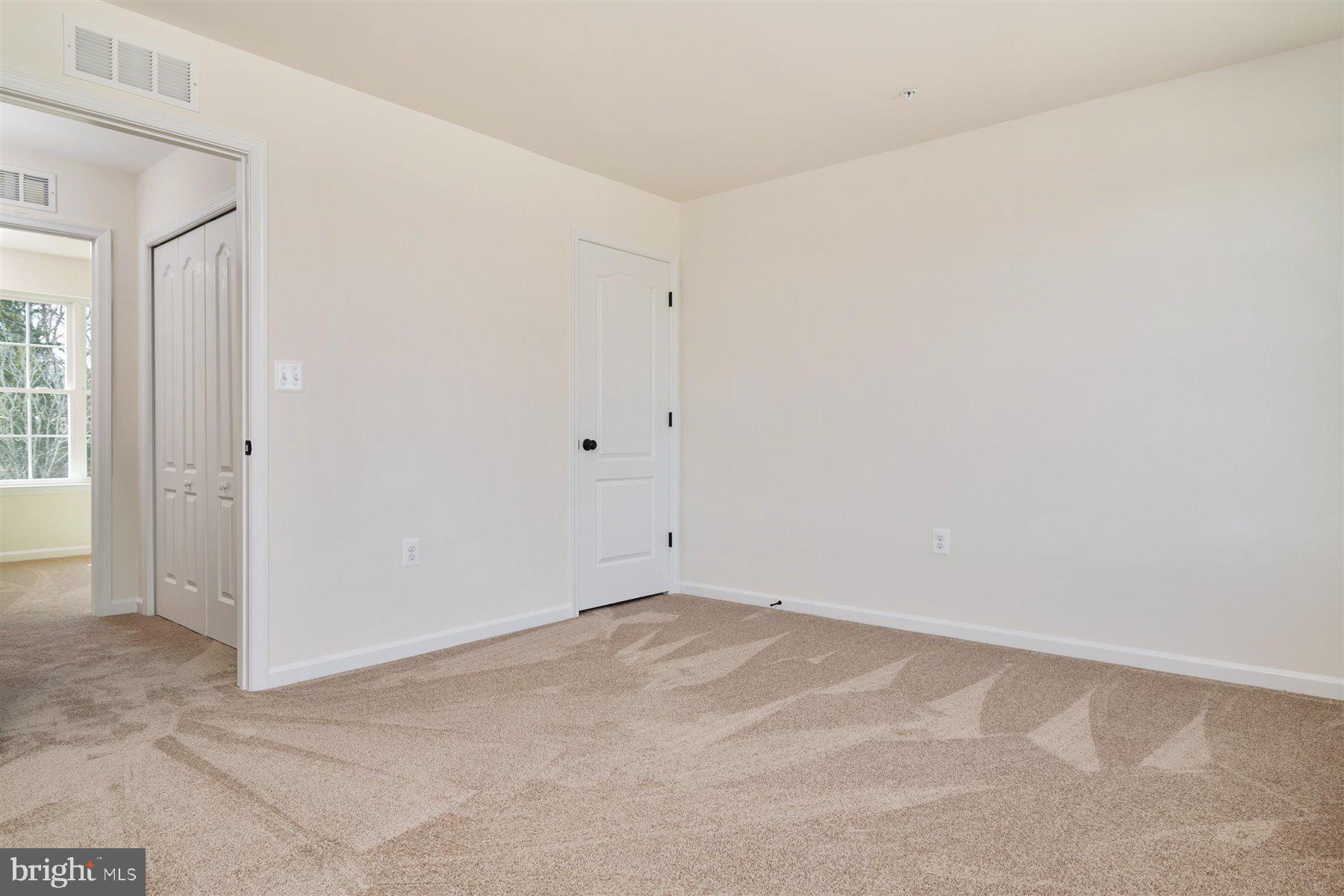 7412 Rossville Boulevard Rosedale, MD 21237 - Photo 26 of 37 an empty room with windows