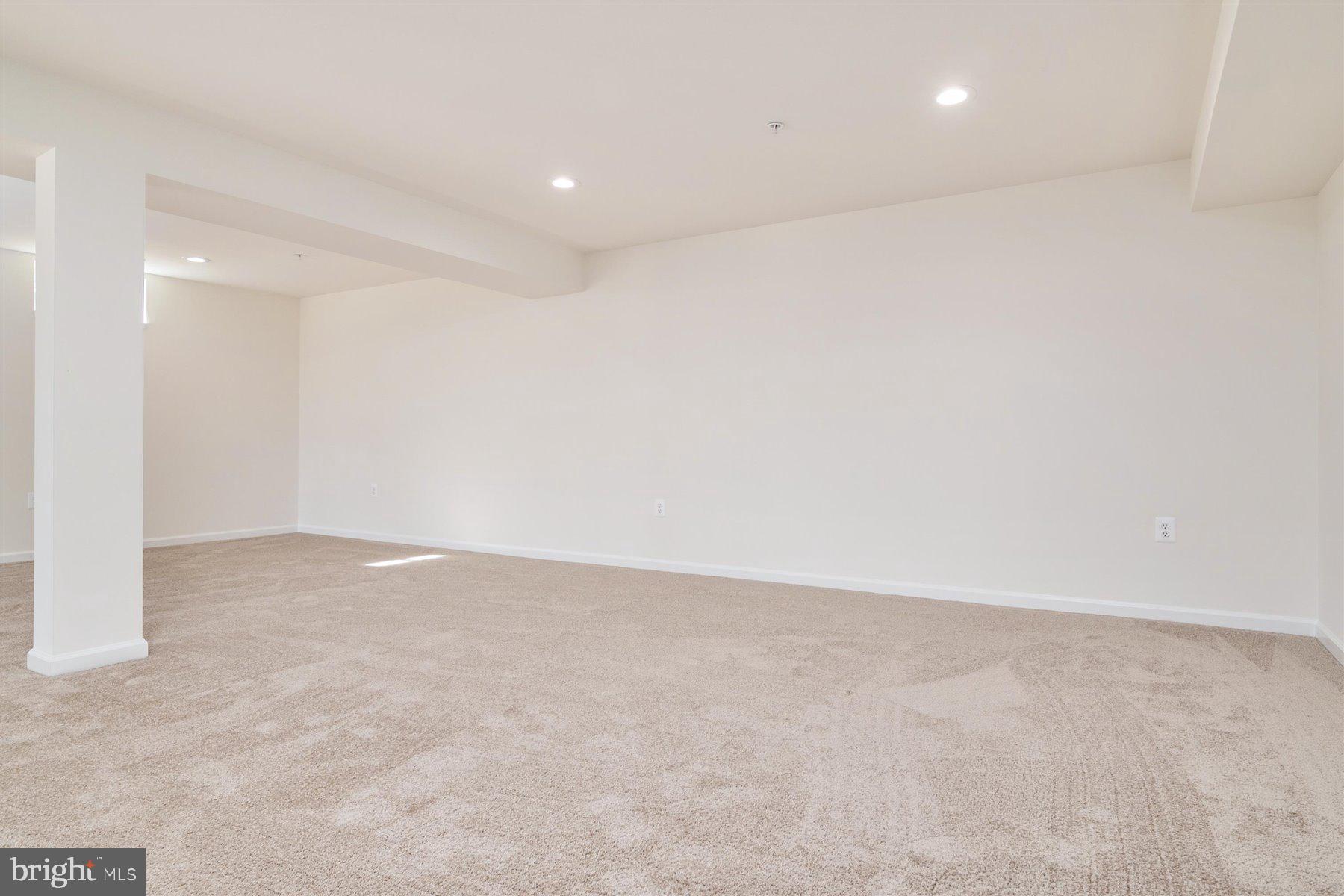 7412 Rossville Boulevard Rosedale, MD 21237 - Photo 30 of 37 an empty room with an entryway