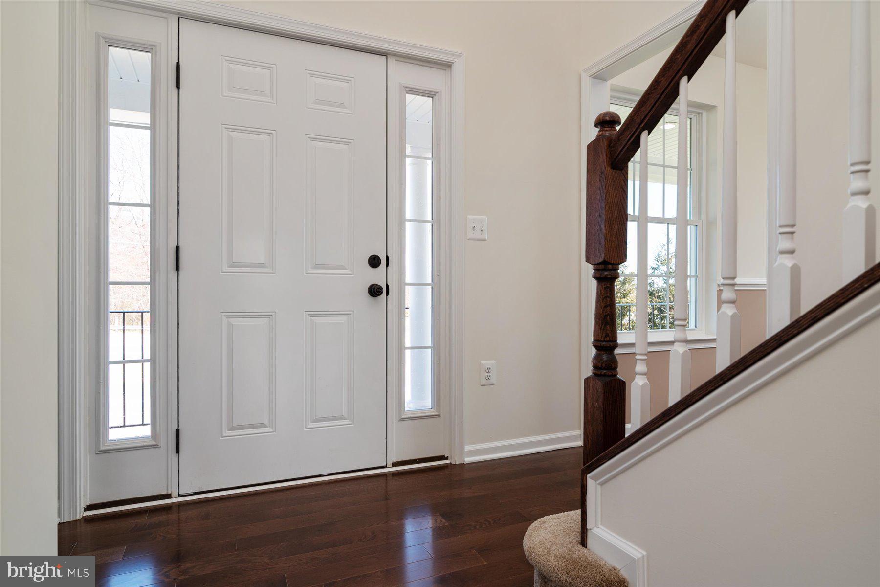 7412 Rossville Boulevard Rosedale, MD 21237 - Photo 7 of 37 a view of front door with furniture and a window