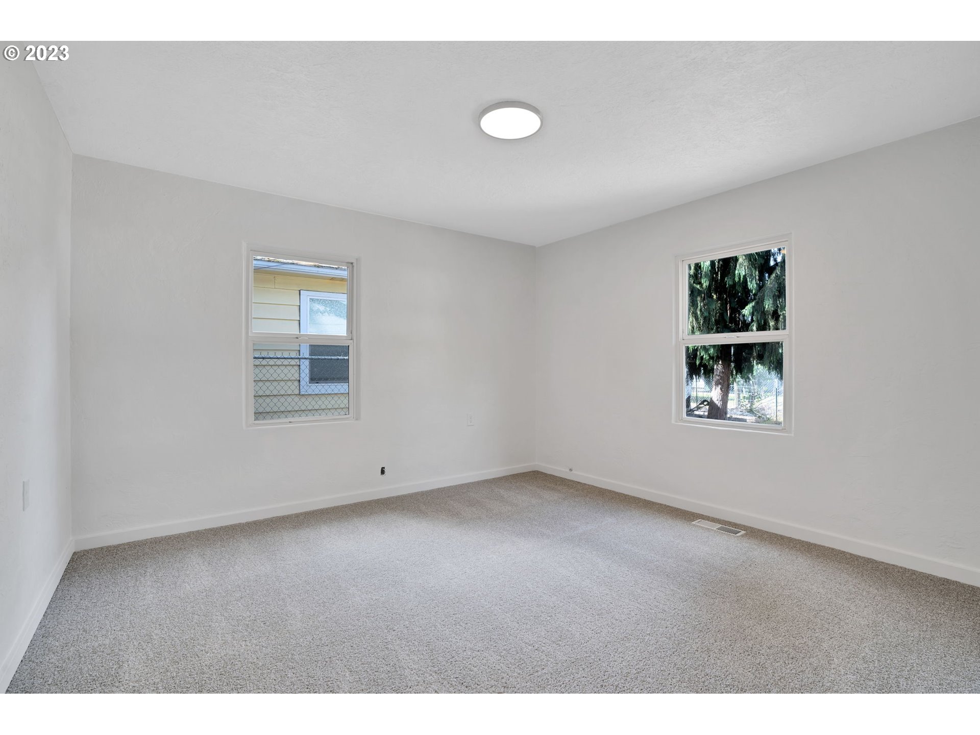 840 High Street Woodburn, OR 97071 - Photo 14 of 18 a view of a livingroom with a window