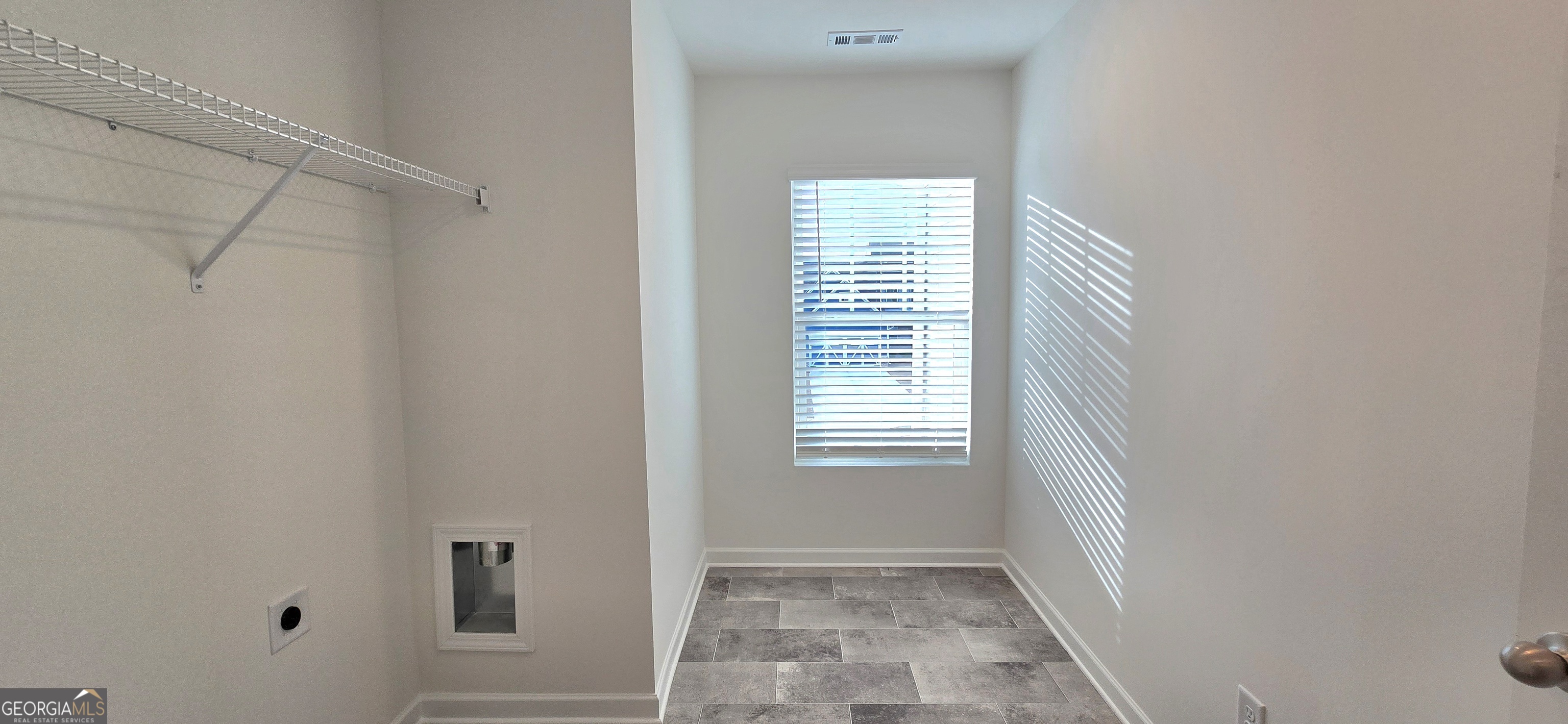 34 Russet Way Newnan, GA 30263 - Photo 14 of 38 a view of an empty room with a window