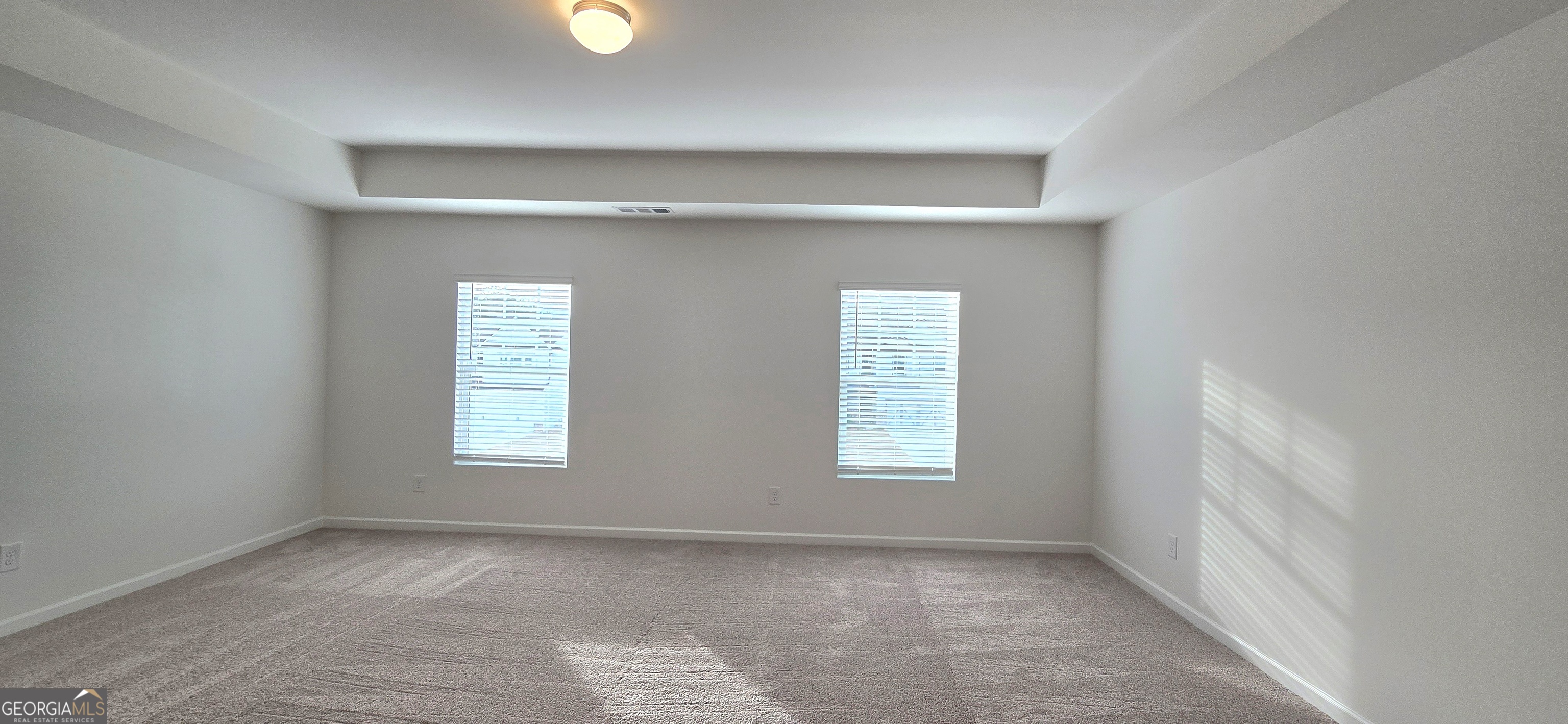 34 Russet Way Newnan, GA 30263 - Photo 19 of 38 an empty room with windows and closet