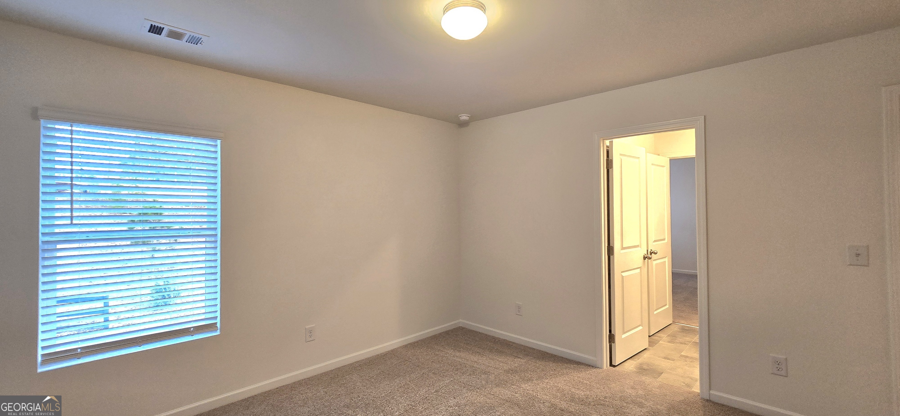 34 Russet Way Newnan, GA 30263 - Photo 31 of 38 a view of an empty room with a window