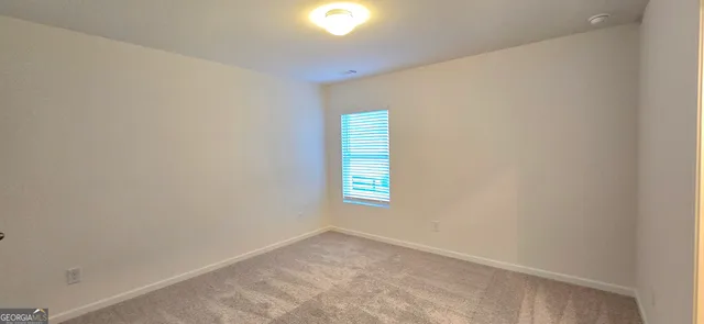 a view of empty room with window