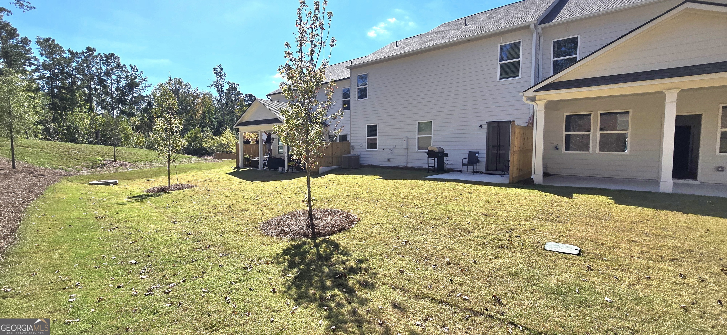 34 Russet Way Newnan, GA 30263 - Photo 37 of 38 a house view with swimming pool in front of it