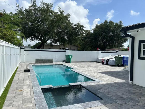 a view of a back yard with green space