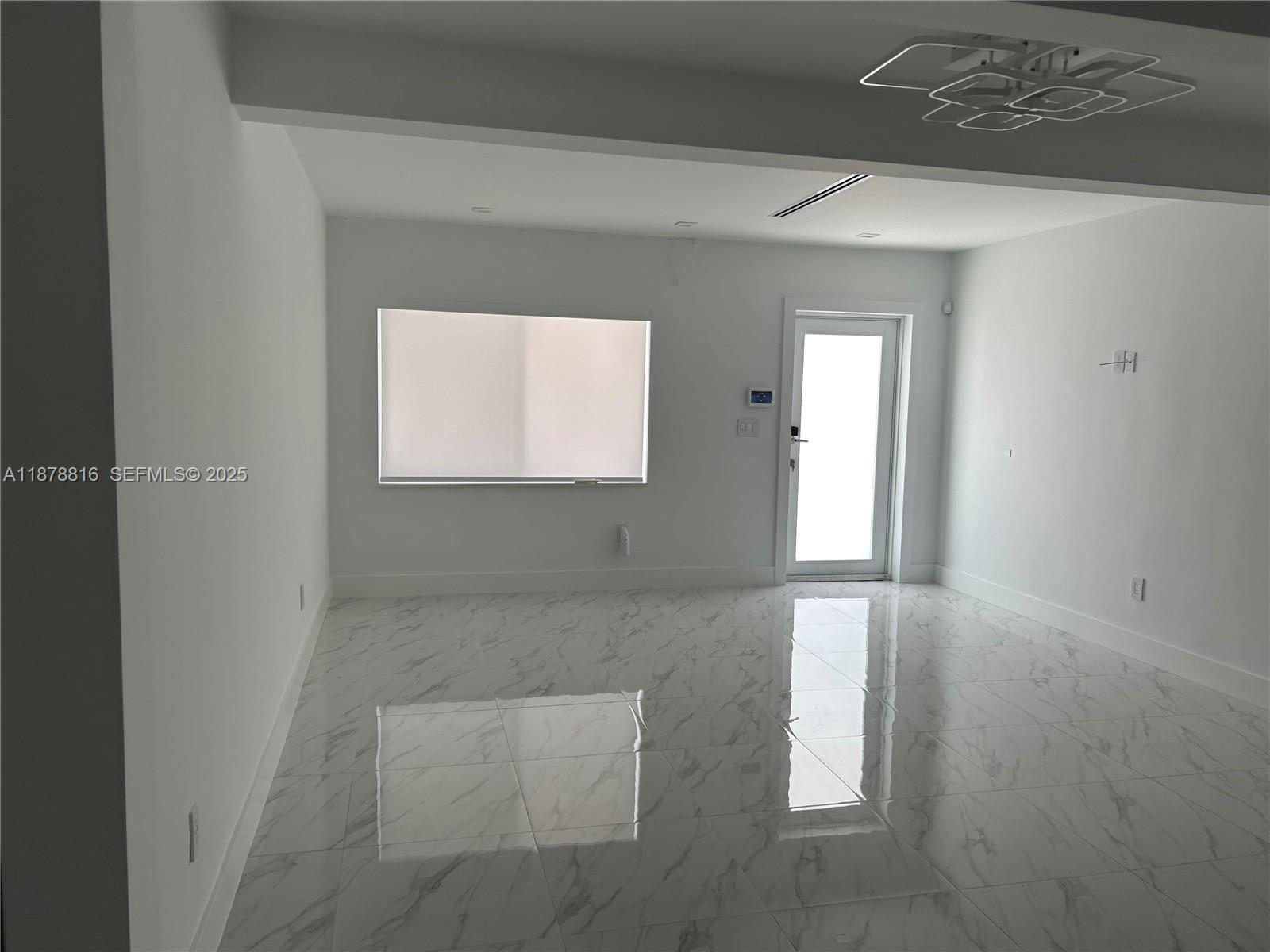 400 Southwest 47th Avenue Miami, FL 33134 - Photo 17 of 55 an empty room with windows