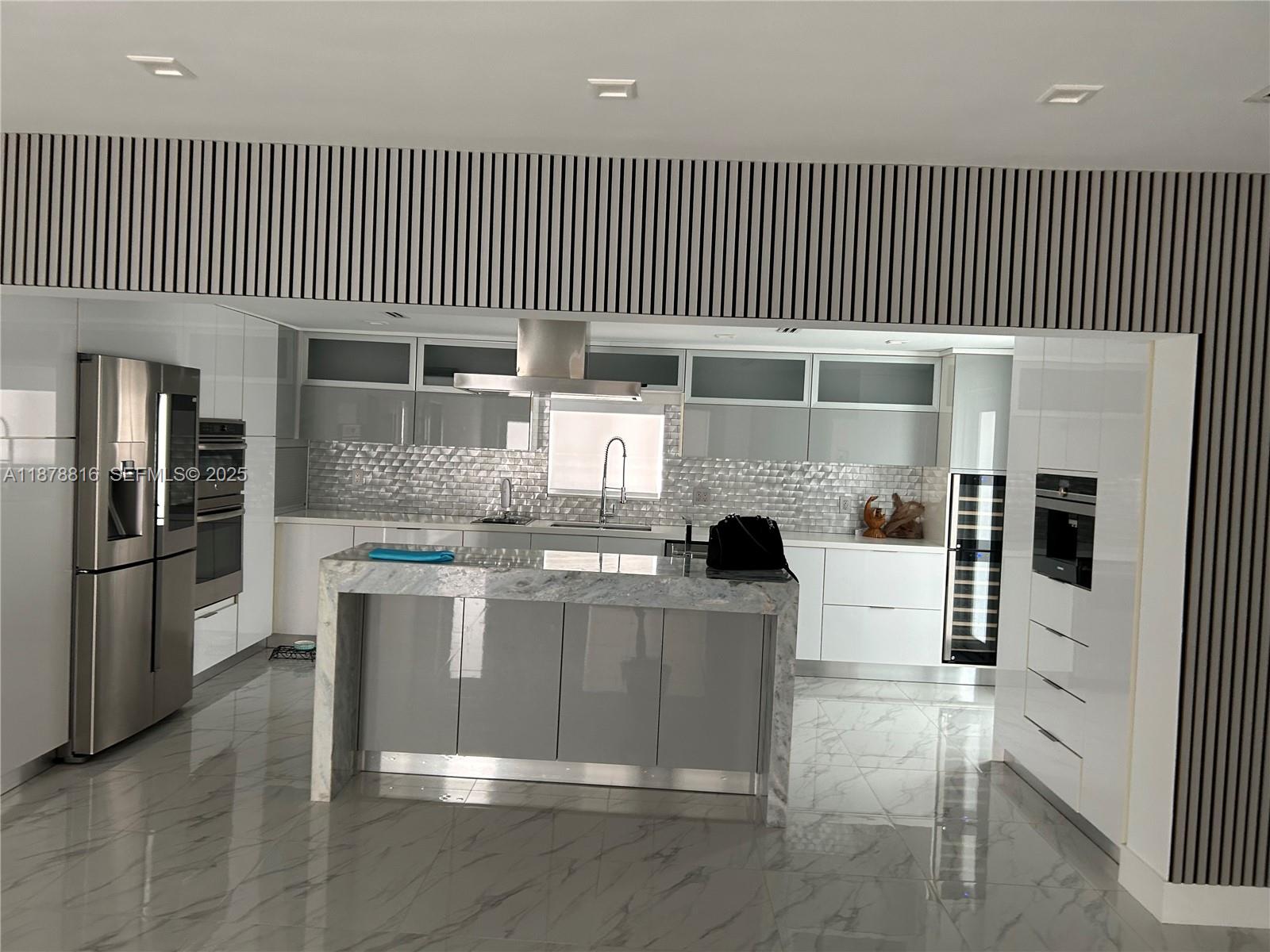 400 Southwest 47th Avenue Miami, FL 33134 - Photo 21 of 55 a kitchen with a table and chairs