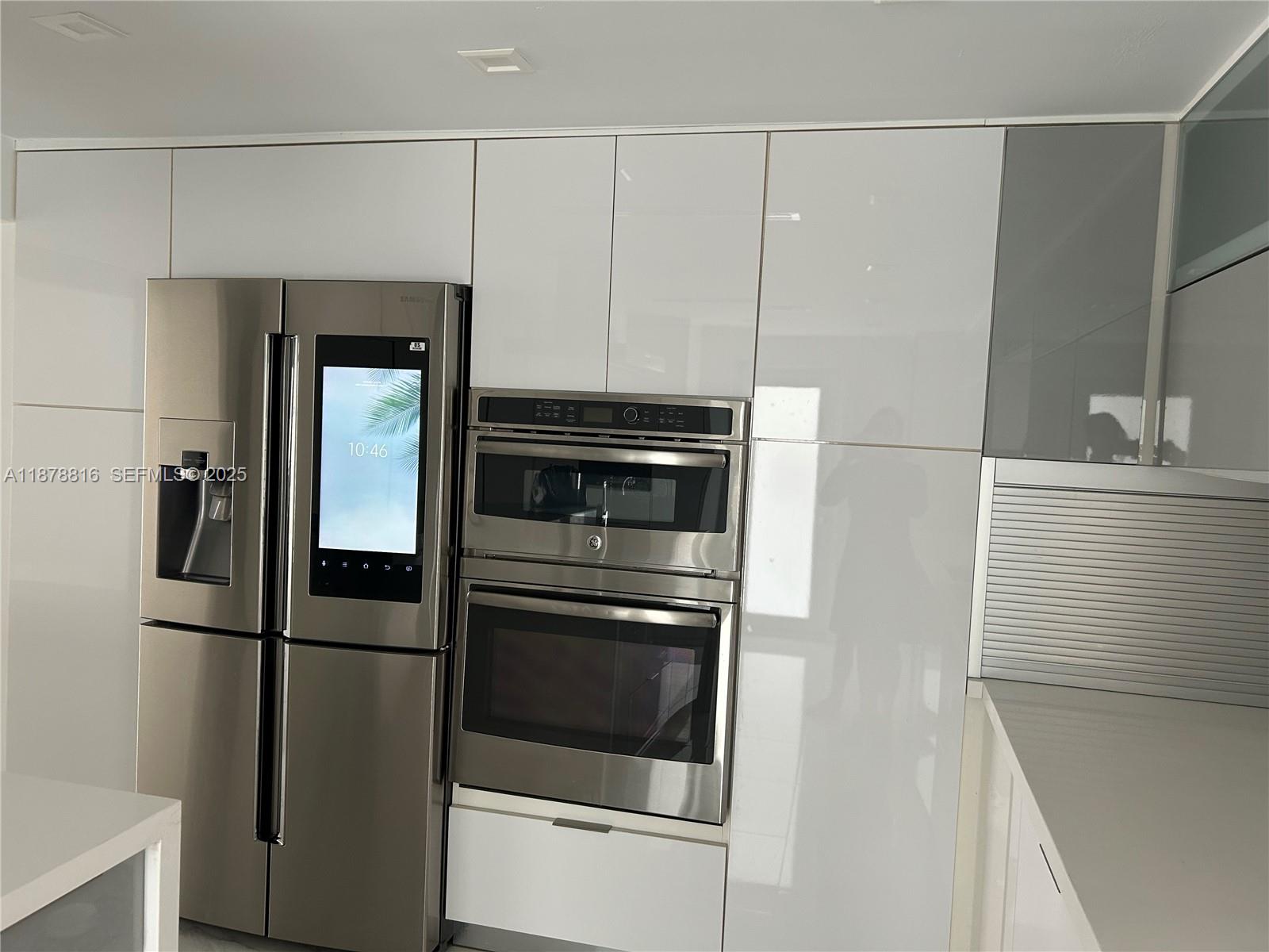 400 Southwest 47th Avenue Miami, FL 33134 - Photo 23 of 55 a kitchen with appliances and cabinets