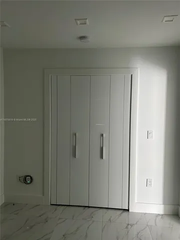 an empty room with a natural light