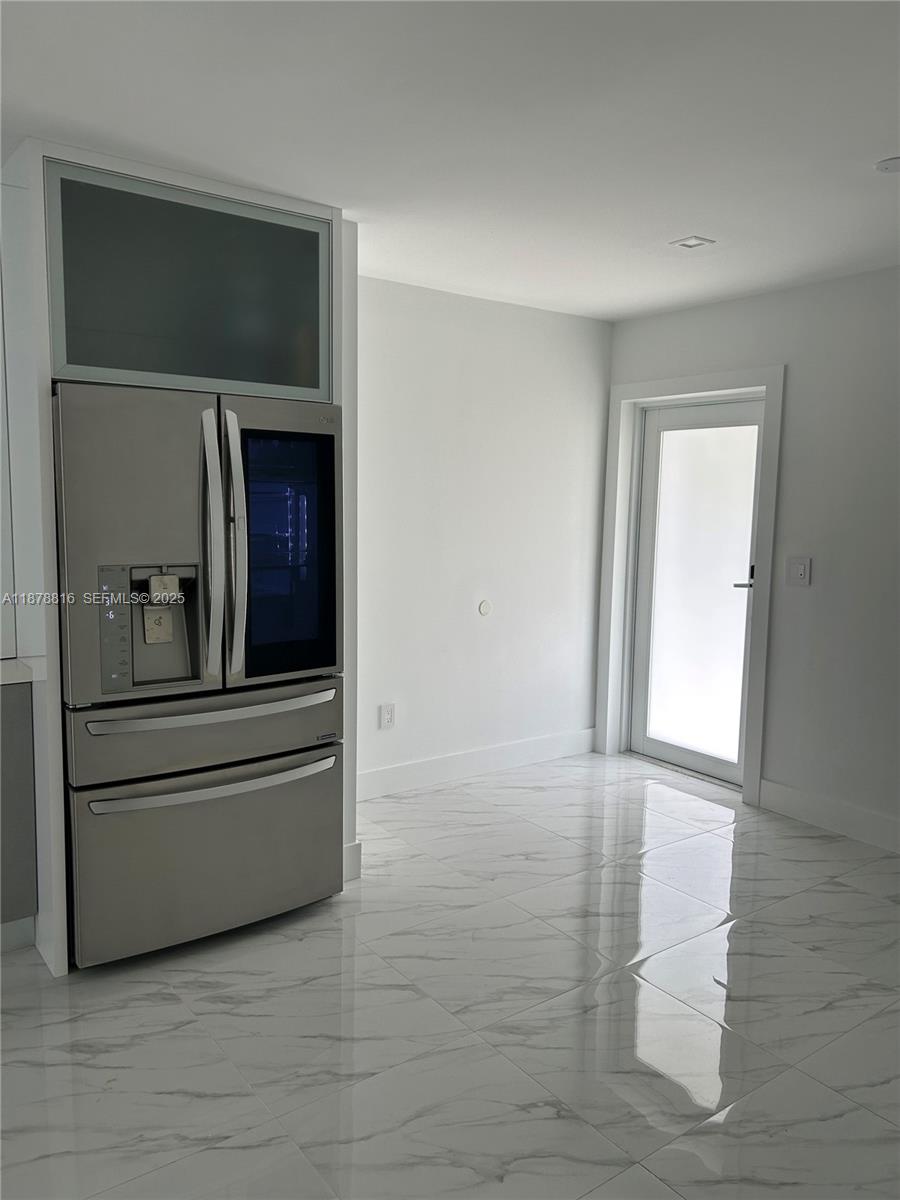 400 Southwest 47th Avenue Miami, FL 33134 - Photo 49 of 55 a view of a hallway to rooms and wooden floor