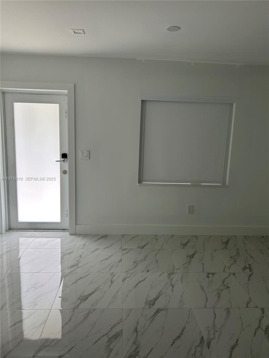 400 Southwest 47th Avenue Miami, FL 33134 - Photo 50 of 55 an empty room with a window