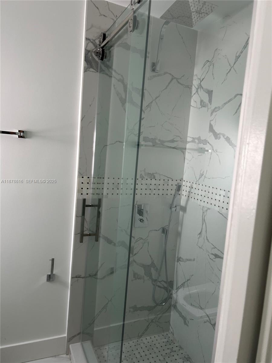 400 Southwest 47th Avenue Miami, FL 33134 - Photo 52 of 55 a bathroom with a shower and toilet