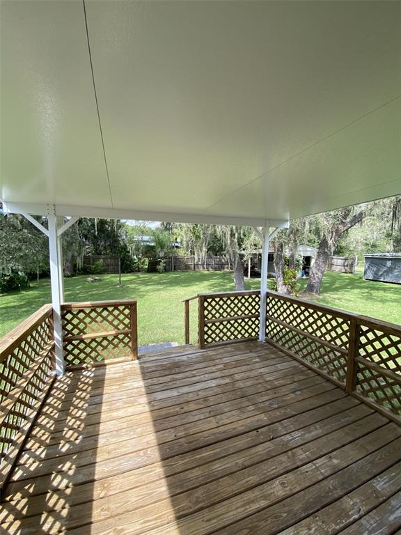 18851 Washington Lane Spring Hill, FL 34610 - Photo 11 of 25 a view of a roof deck