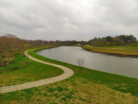 7206 Capitol Street Houston, TX 77011 - Photo 3 of 5 a view of a lake with a mountain in the background