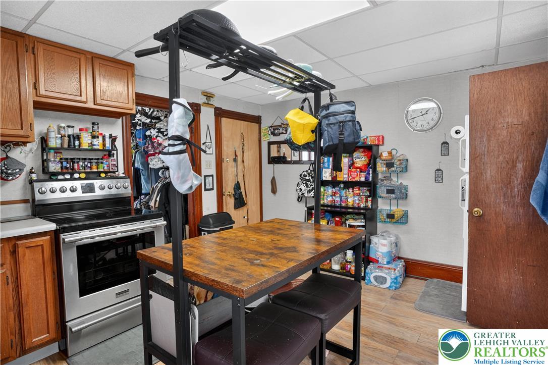 357 Main Road Lehighton, PA 18235 - Photo 20 of 38 a kitchen with stainless steel appliances granite countertop a stove a refrigerator and a dining table