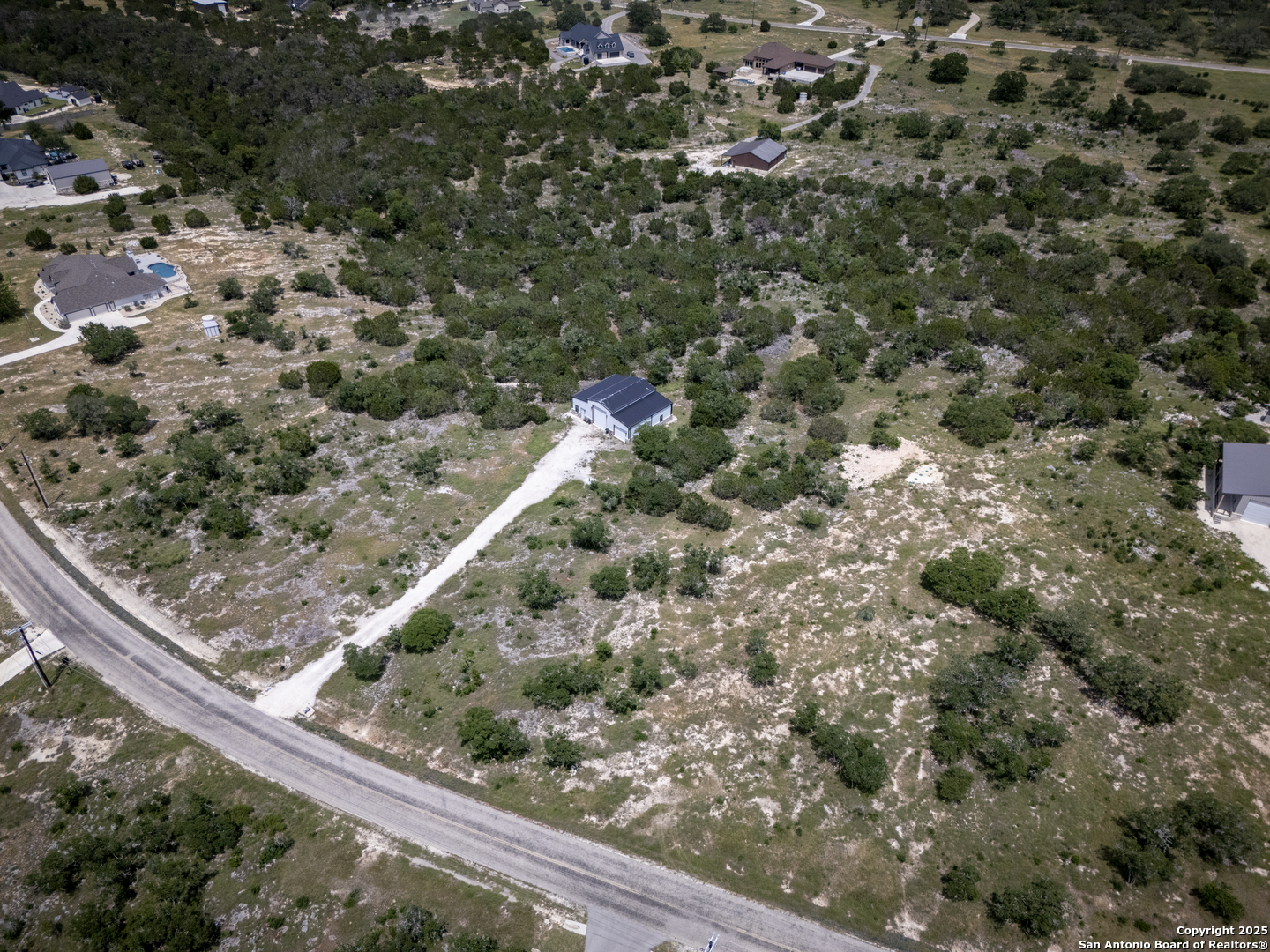 37 Sabinas Ridge Road Boerne, TX 78006 - Photo 15 of 18 a view of a forest with a tree