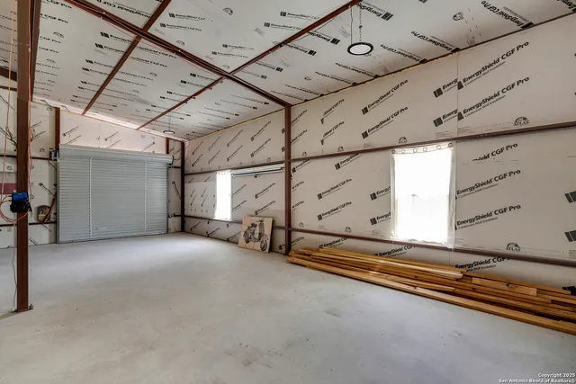 a view of a garage with furniture