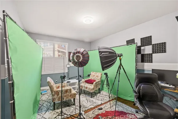 a view of a dining room with furniture and entryway