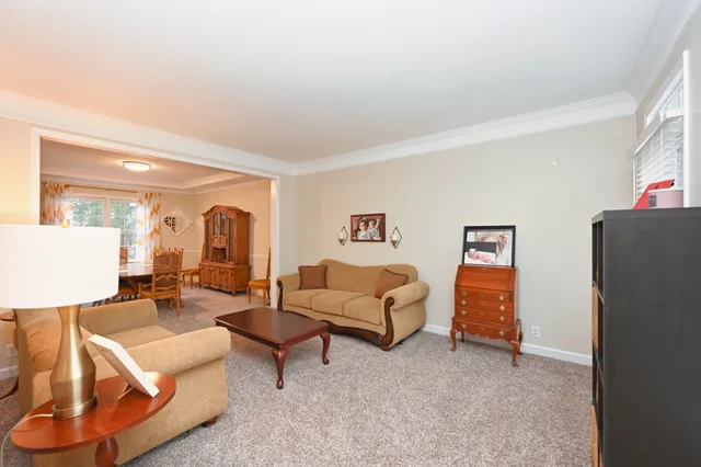 a living room with furniture and a couch