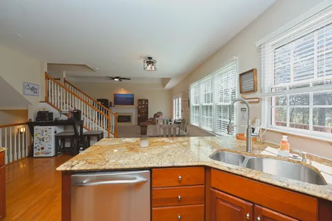 a white bath tub sitting next to a window
